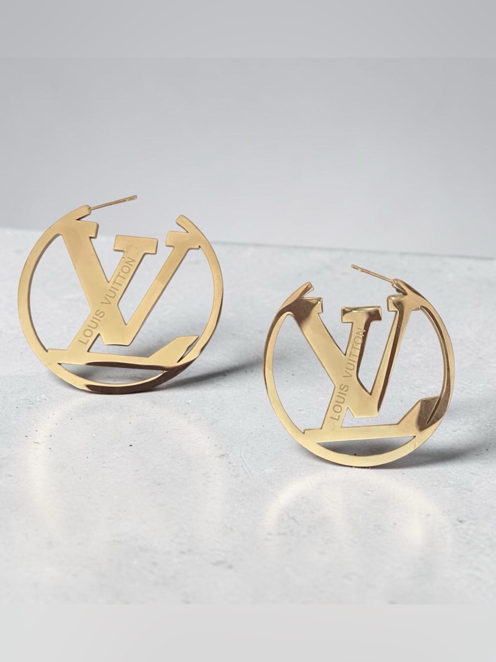 Louis Vuitton Gold Signature LV Circle Earrings